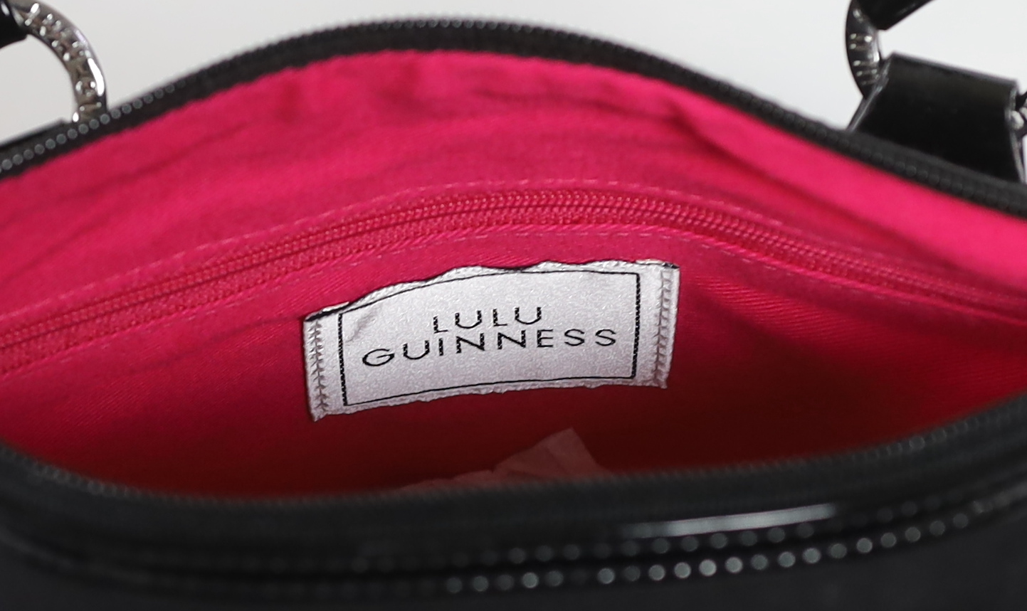 A Lulu Guinness vintage 'Keira' Love Graffiti embroidered canvas bag, unused with lilac dust bag, height 18cm, to handle 25cm, width 27cm, depth 9cm